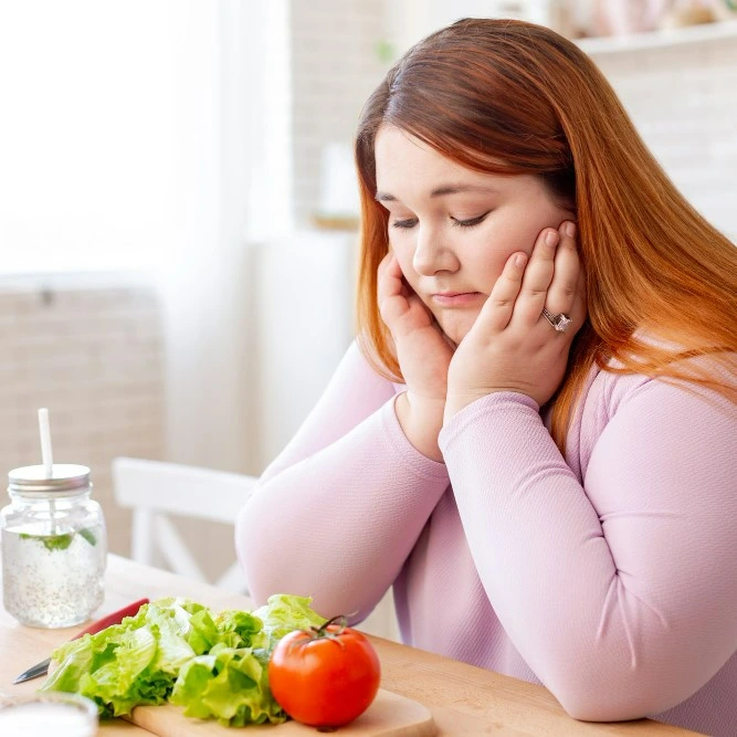 Sad with healthy food